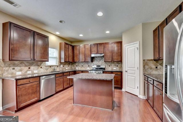 4228 Woods Creek Lane, Suwanee, GA 30024
