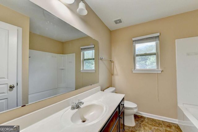 4228 Woods Creek Lane, Suwanee, GA 30024