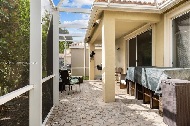 1199 Golden Cane Dr, Weston, FL 33327