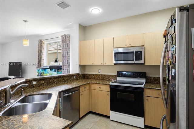 1199 Golden Cane Dr, Weston, FL 33327