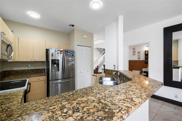 1199 Golden Cane Dr, Weston, FL 33327