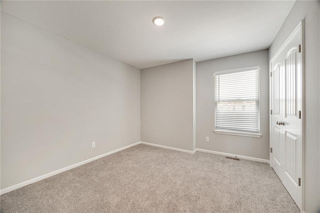 606 Wild Lupine Lane, Raymore, MO 64083