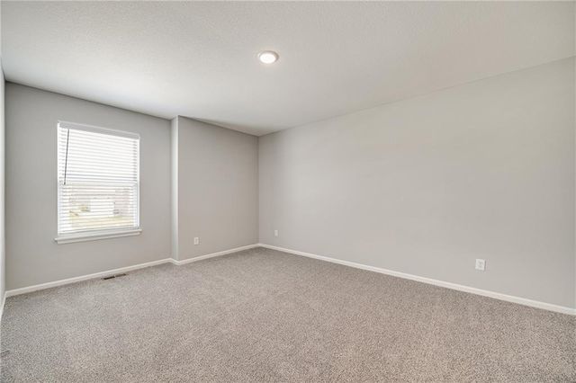 606 Wild Lupine Lane, Raymore, MO 64083