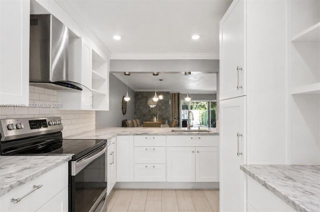 789 Crystal Lake Drive, Deerfield Beach, FL 33064