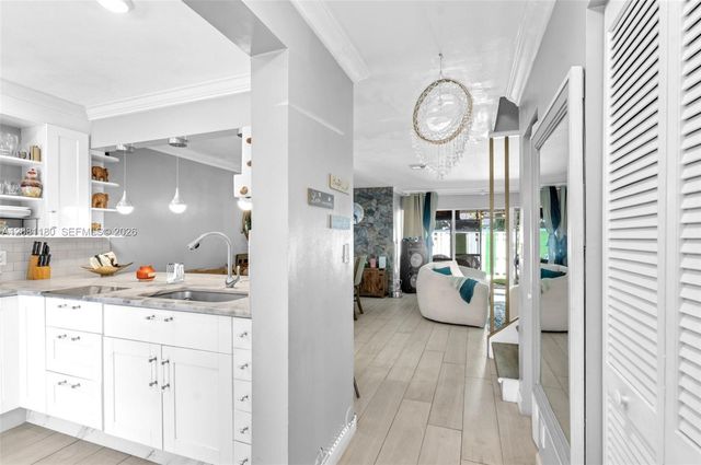 789 Crystal Lake Drive, Deerfield Beach, FL 33064
