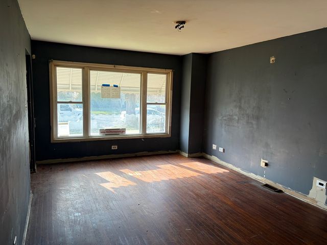 15129 LEXINGTON Avenue, Harvey, IL 60426