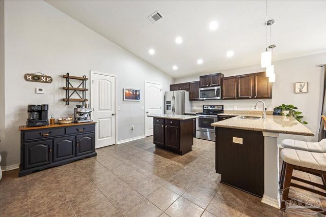 5612 Peach Dr, Pace, FL 32571