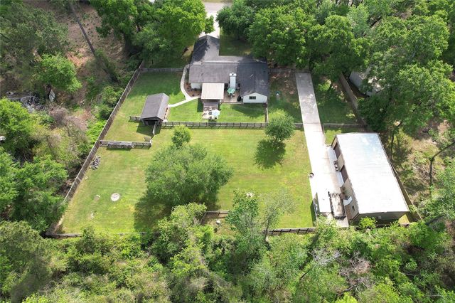 142 Sentinel Oaks, Pinehurst, TX 77362