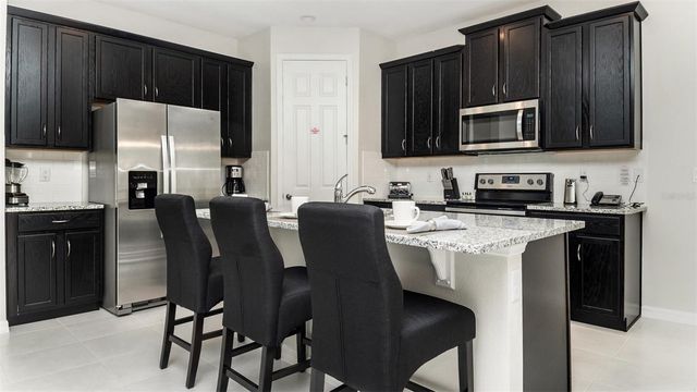 9038 PELICAN COVE TRACE, Kissimmee, FL 34747