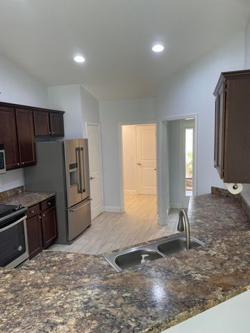 150 SW De Gouvea Terrace, Port St Lucie, FL 34984