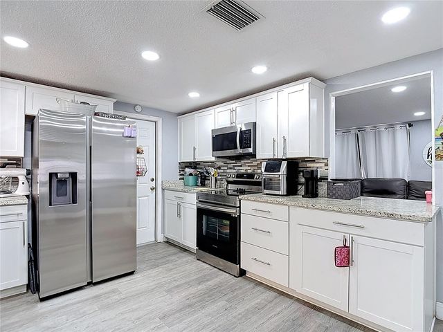 5913 APPLETREE ROAD, Holiday, FL 34690