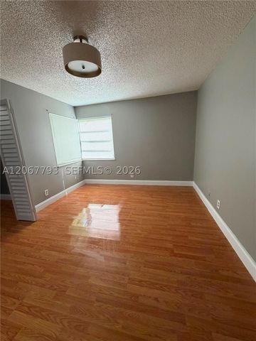 3100 Riverside Dr 104, Coral Springs, FL 33065