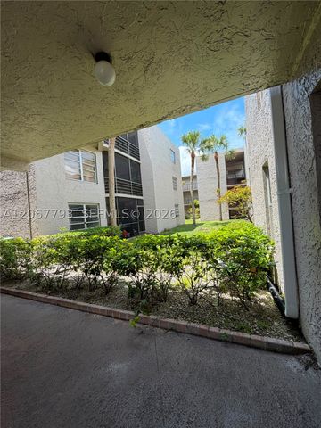 3100 Riverside Dr 104, Coral Springs, FL 33065
