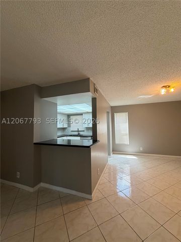 3100 Riverside Dr 104, Coral Springs, FL 33065