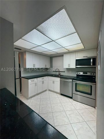 3100 Riverside Dr 104, Coral Springs, FL 33065