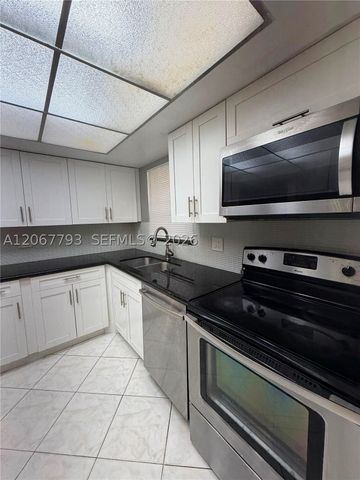 3100 Riverside Dr 104, Coral Springs, FL 33065