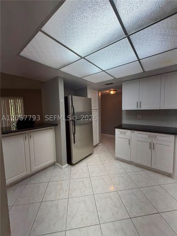 3100 Riverside Dr 104, Coral Springs, FL 33065