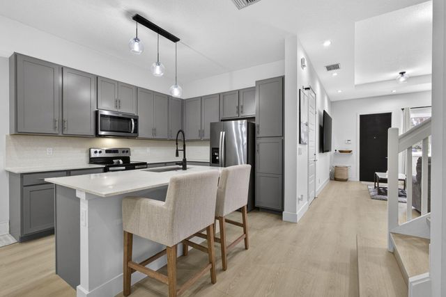 1120 Pioneer Way, Royal Palm Beach, FL 33411