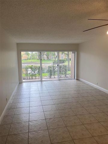 8701 Wiles Rd 108, Coral Springs, FL 33067