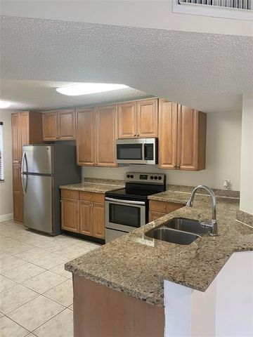 8701 Wiles Rd 108, Coral Springs, FL 33067