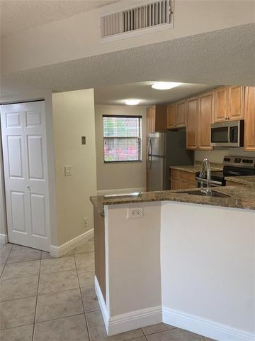 8701 Wiles Rd 108, Coral Springs, FL 33067