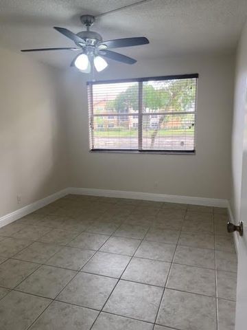8701 Wiles Rd 108, Coral Springs, FL 33067
