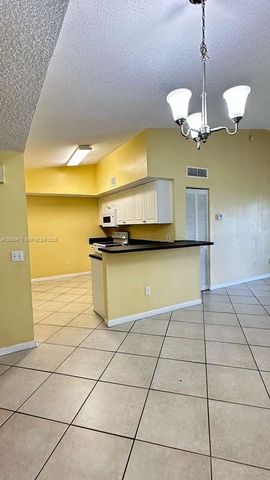 9645 NW 1st Ct 1-303, Pembroke Pines, FL 33024