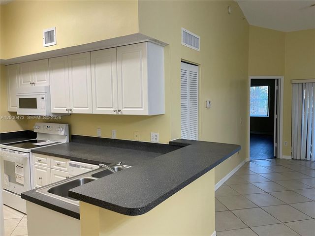 9645 NW 1st Ct 1-303, Pembroke Pines, FL 33024