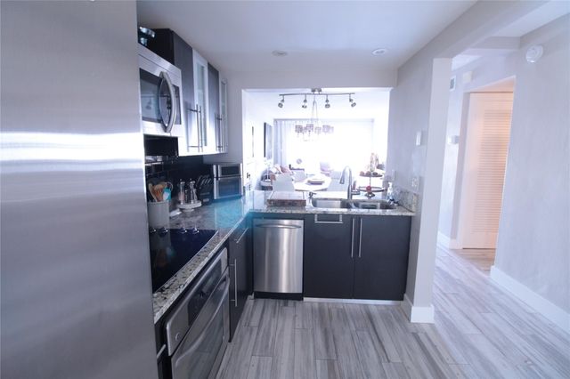 440 Paradise Isle Boulevard 105, Hallandale Beach, FL 33009