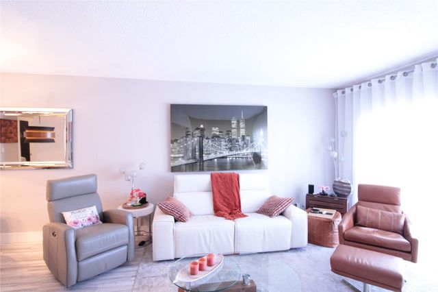 440 Paradise Isle Boulevard 105, Hallandale Beach, FL 33009