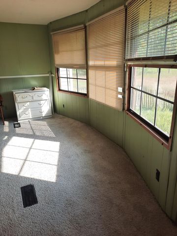 1124 Eddy School Road, Bellaire, MI 49615