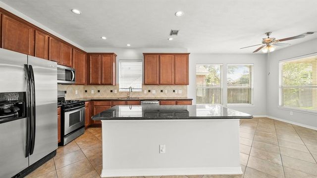25215 Kelton Hills Lane, Richmond, TX 77406