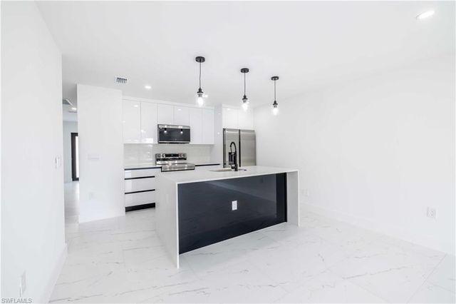 338 Harry AVE S, Lehigh Acres, FL 33973