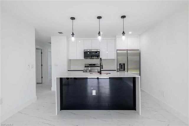 338 Harry AVE S, Lehigh Acres, FL 33973