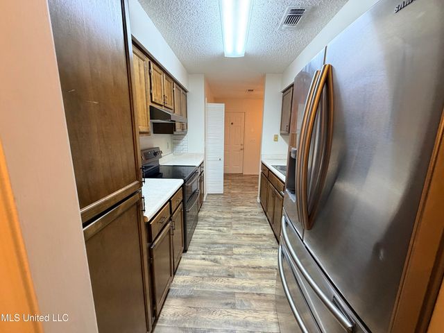 566 Ahuawa Place, Diamondhead, MS 39525