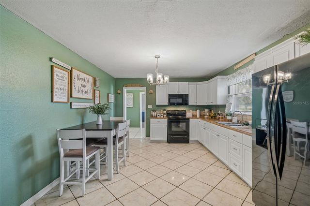 7307 N HUNTLEY AVENUE, Tampa, FL 33604