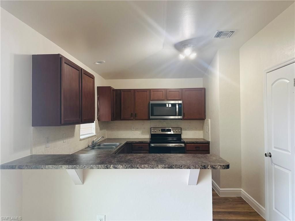 2017 NW 1st AVE, CAPE CORAL, FL 33993 — photo 4
