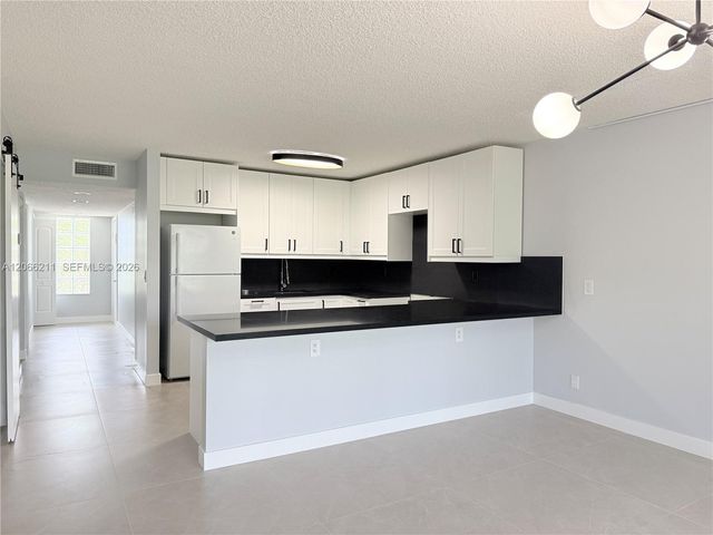16511 Blatt Boulevard 203, Weston, FL 33326