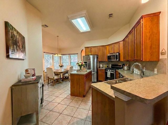 9206 Hidden Lake E, Magnolia, TX 77354