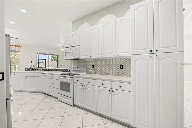 13848 VISTA DEL LAGO BOULEVARD, Clermont, FL 34711