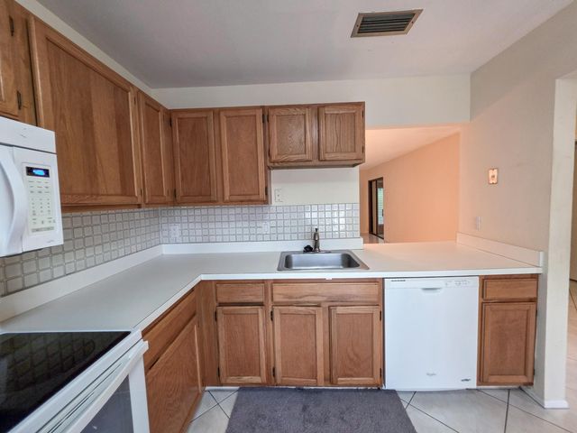 103 Rose Bay Court, Royal Palm Beach, FL 33411