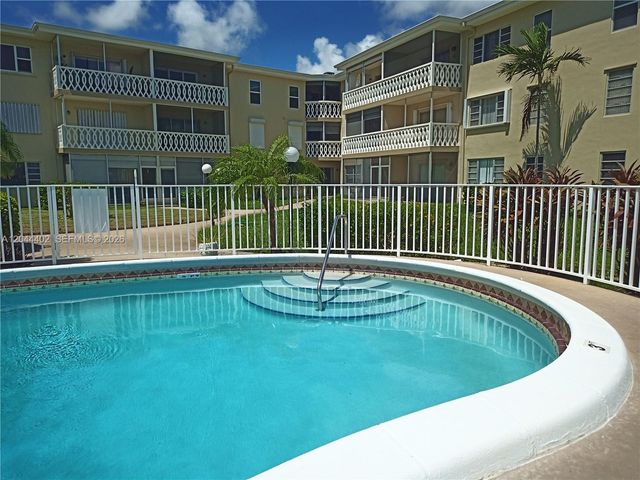 450 Golden Isles Drive 2H, Hallandale Beach, FL 33009