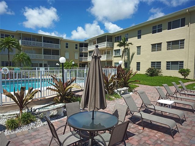 450 Golden Isles Drive 2H, Hallandale Beach, FL 33009