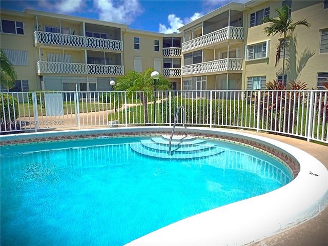 450 Golden Isles Drive 2H, Hallandale Beach, FL 33009