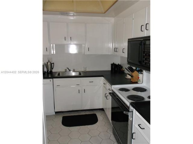 450 Golden Isles Drive 2H, Hallandale Beach, FL 33009