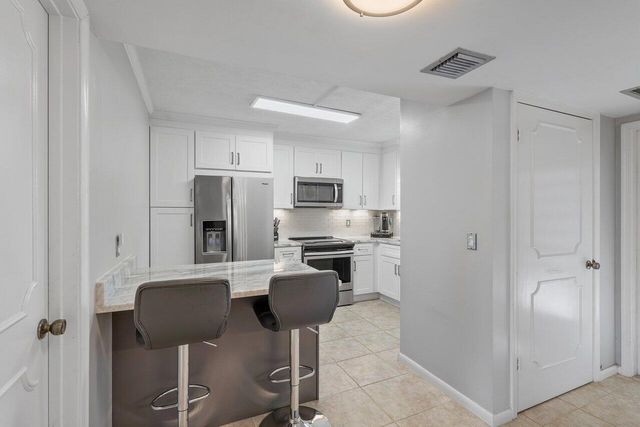 2420 Deer Creek Country Club Boulevard 205-D, Deerfield Beach, FL 33442