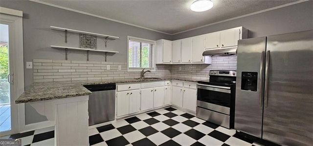 1096 Deleon Court, Clarkston, GA 30021