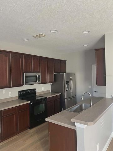 2311 J LAWSON BOULEVARD, Orlando, FL 32824