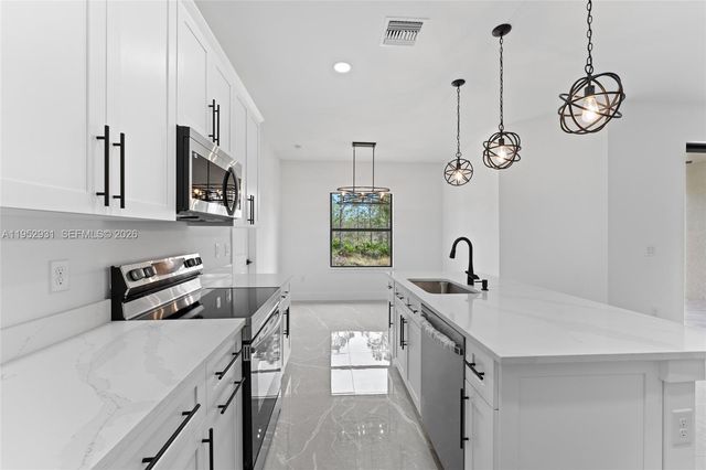 1024 Chauncey AV, Lehigh Acres, FL 33971