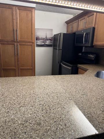 712 Sunny Pine Way, Greenacres, FL 33415